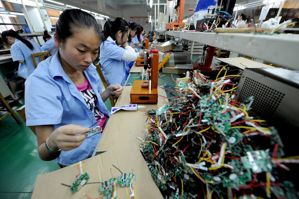 Workers at an electronics factory in the eastern province of Anhui. Saudi Arabia and France invested heavily in China in the first two months of this year. But others are have been deterred by rising costs such as wages, and are setting up in emerging economies like Vietnam. Photo: AFP