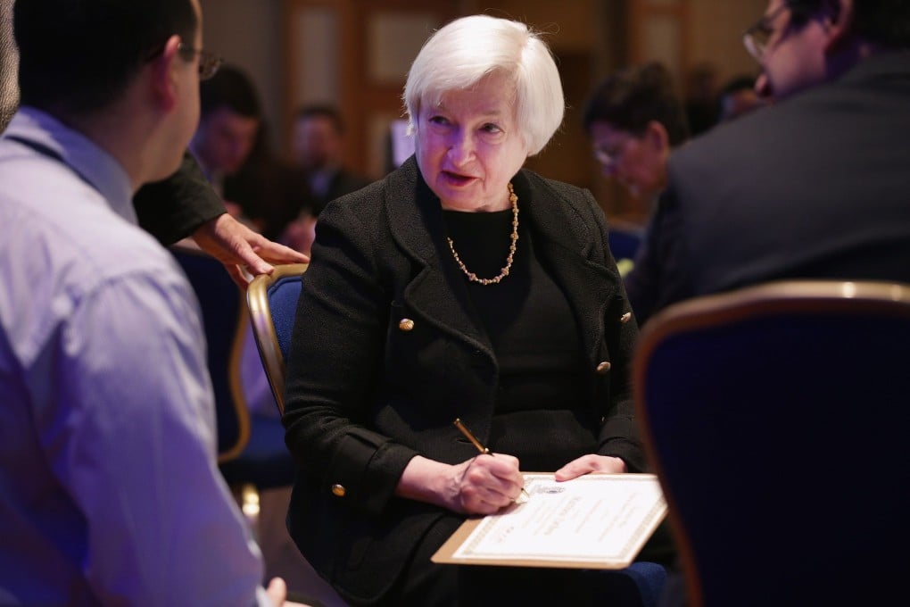 US Federal Reserve chair Janet Yellen talks with Fed employees in Washington as it prepares to raise interest rates later this year. Photo: AFP