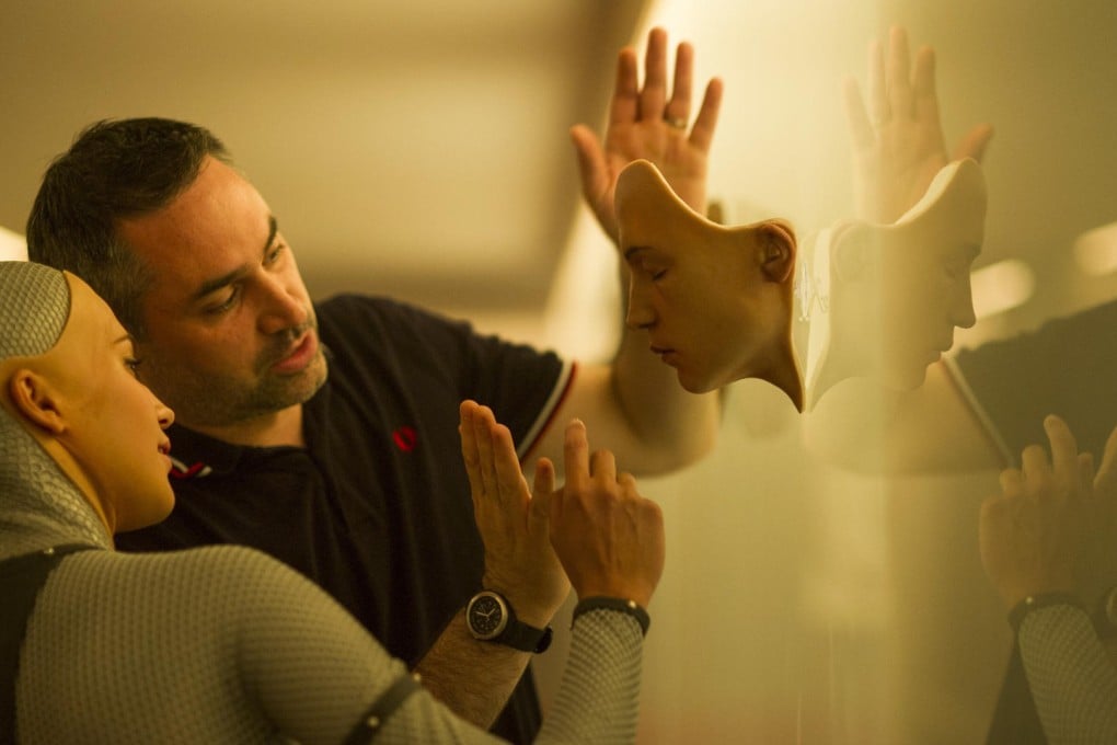 Director Alex Garland with Alicia Vikander, who plays Ava the robot.