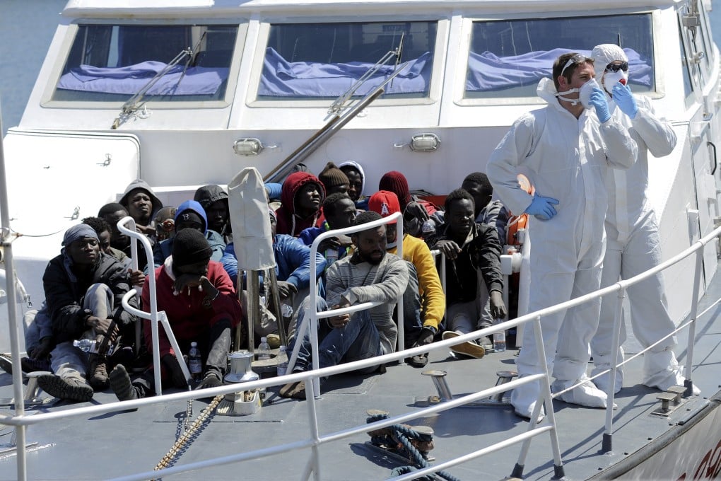 A group of migrants arrives in Palermo on Wednesday. It's not clear if their vessel was the one from which Christians were allegedly hurled overboard by Muslim passengers. Photo: Reuters
