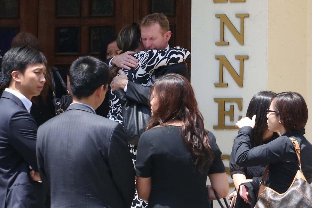 Mourners embrace St Anne's Church in Stanley. Photo: Felix Wong