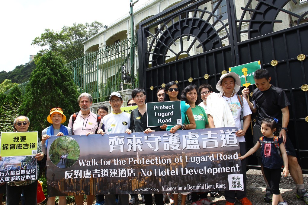 Members of Alliance for a Beautiful Hong Kong hold placard protest outside Lugard Road 27 during a protest against the proposed construction of a hotel in The Peak. Photo: Dickson Lee