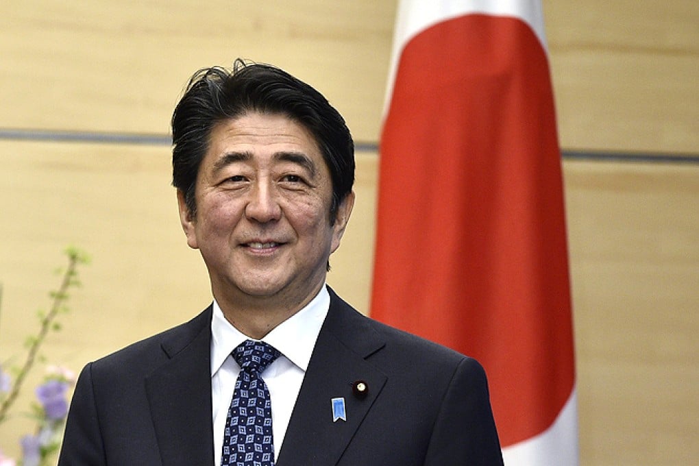 Prime Minister Shinzo Abe will seek discussions with President Xi next week. Photo: AP