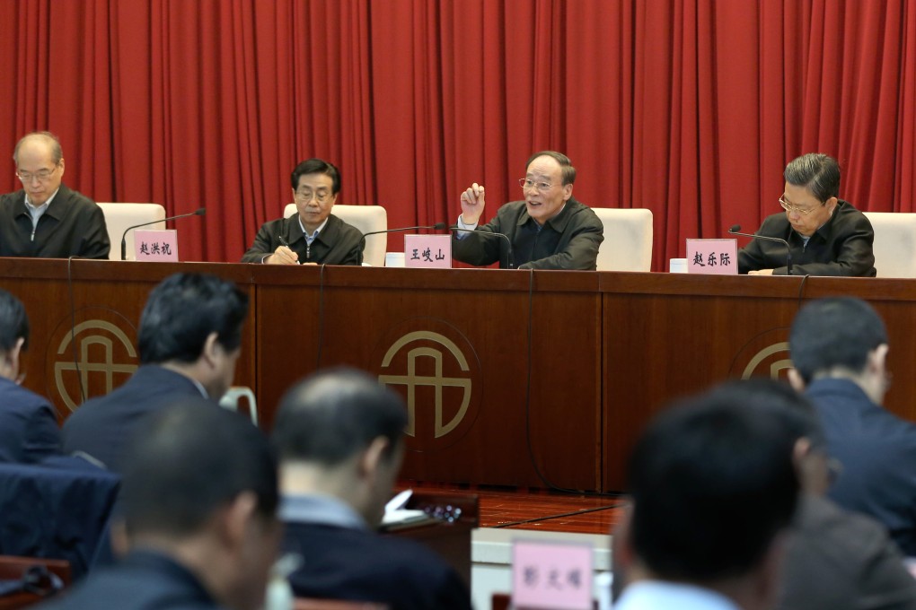 Chief graft-buster Wang Qishan (second from right) said this year''s first round of disciplinary inspections would focus on 26 centrally run businesses. All are on the Fortune Global 500 list. Photo: Xinhua