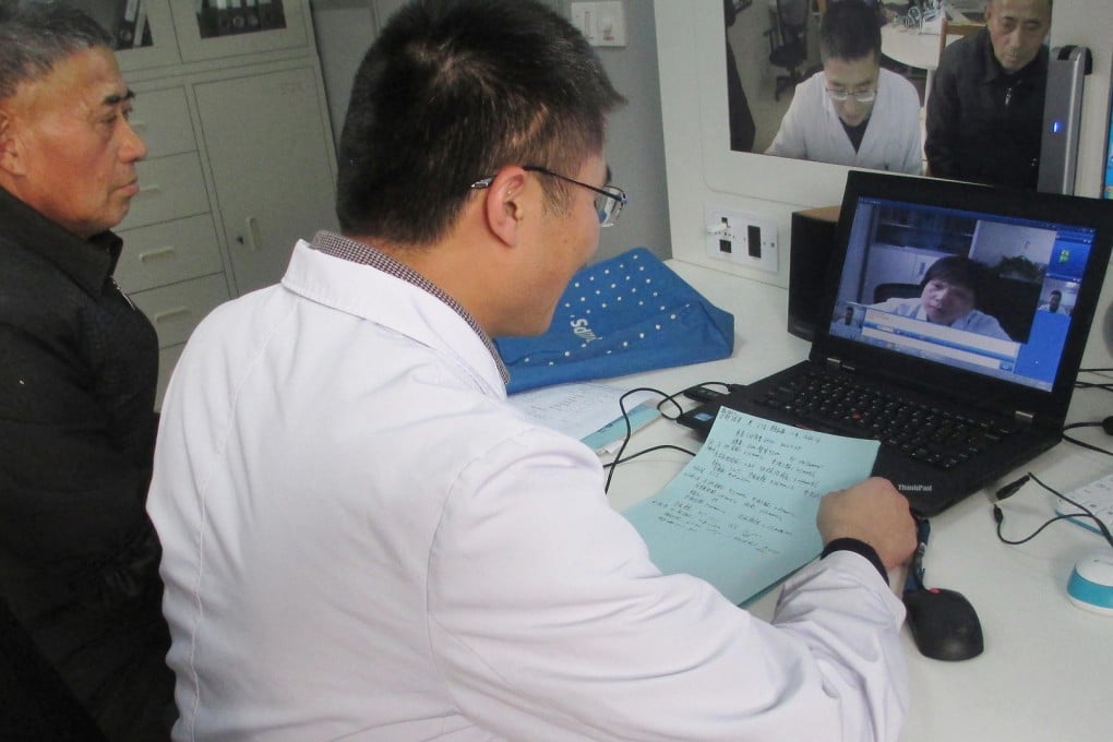 Health 'screening': Farmer Xing Peirong, 68, and his doctor Li Xixu use an online video link to discuss Xing's diabetes with Dr Chen Yuhong, a leading endocrinologist at Shanghai's Ruijin Hospital. Photo: Alice Yan