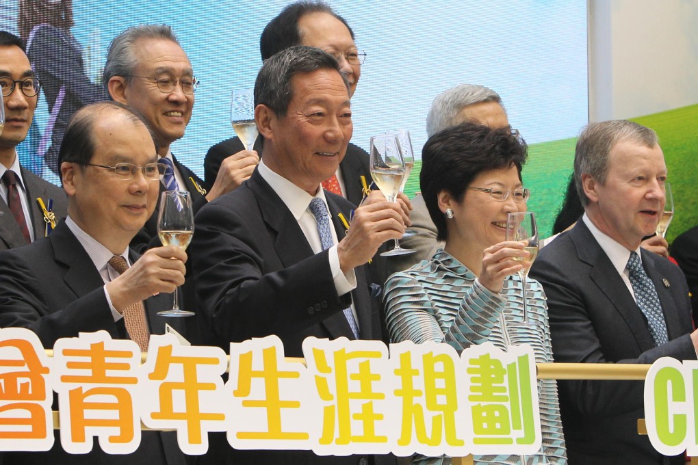 Chief Secretary Carrie Lam (second right) joins Jockey Club executives in toasting scheme's launch at Sha Tin Racecourse. Photo: Franke Tsang
