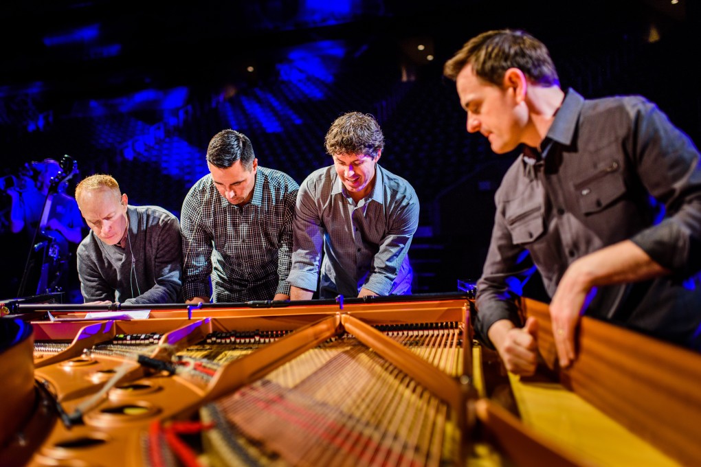 The Piano Guys (from left) Jon Schmidt, Al van der Beek, Paul Anderson, and Steven Sharp Nelson perform their version of 'What Makes You Beautiful' - with a single piano.