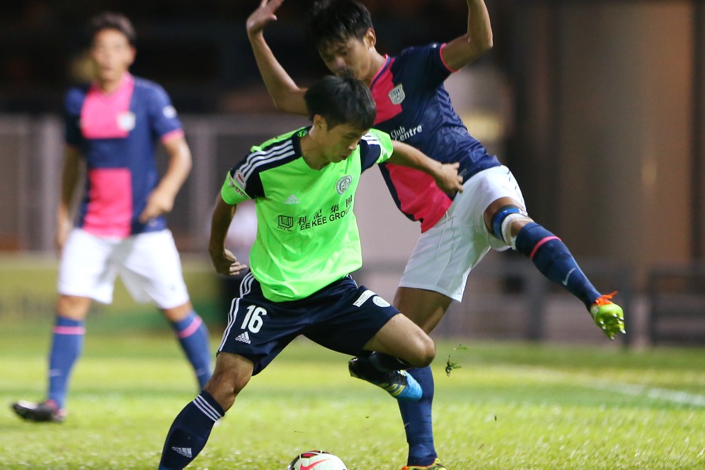 Wofoo Tai Po's Lam Ngai-Tong (front) in action during a Hong Kong Premier League match. Tai Po managed to stave off relegation with a victory over Wong Tai Sin. Photo: K.Y. Cheng