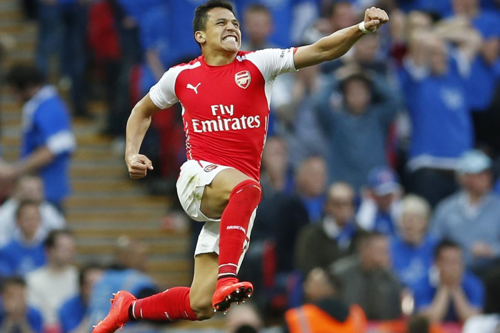 Alexis Sanchez celebrates after scoring the second goal for Arsenal in their FA Cup semi-final at Wembley. Photos: Reuters