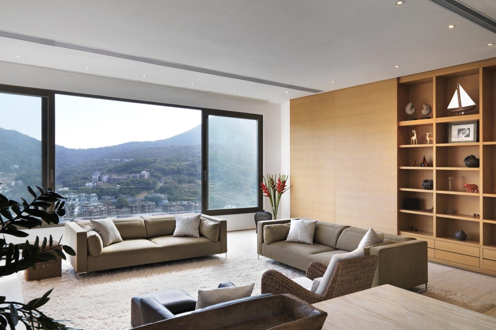 Full height sliding doors conceal shelving.