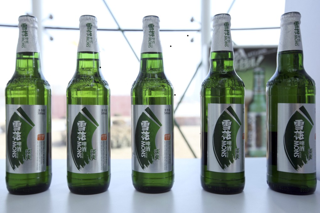 Bottles of Snow Beer on display in China. Photo: Bloomberg