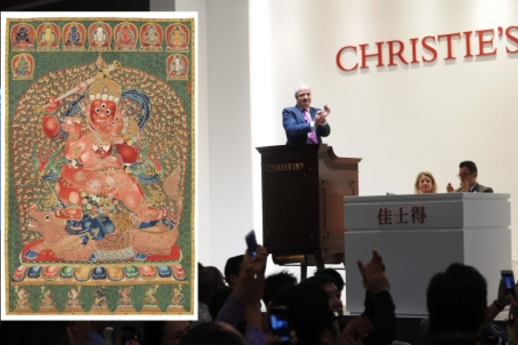 Shanghai billionaire Liu Yiqian paid HK$348.4 million for a Tibetan tapestry at a Christie's auction last November. Younger rich buyers are now keen on collecting. Photo: SCMP Pictures