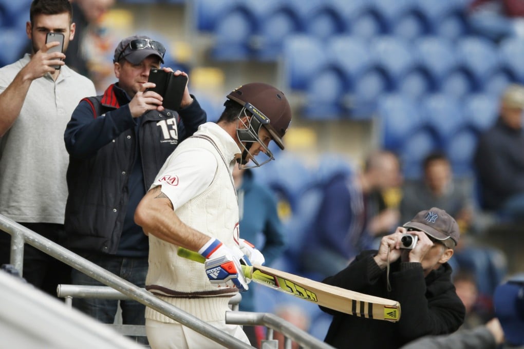 Kevin Pietersen walks out to bat for Surrey against Glamorgan. Photo: Reuters