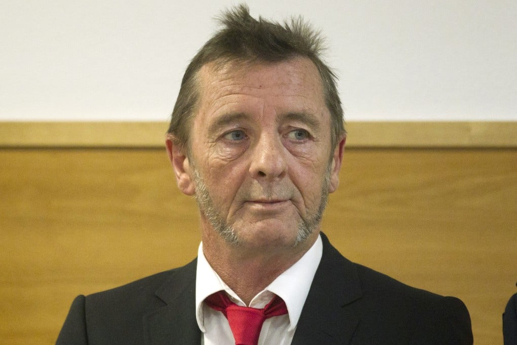 AC/DC drummer Phil Rudd today made a surprise guilty plea on a charge of threatening to kill an associate. Photo: AP