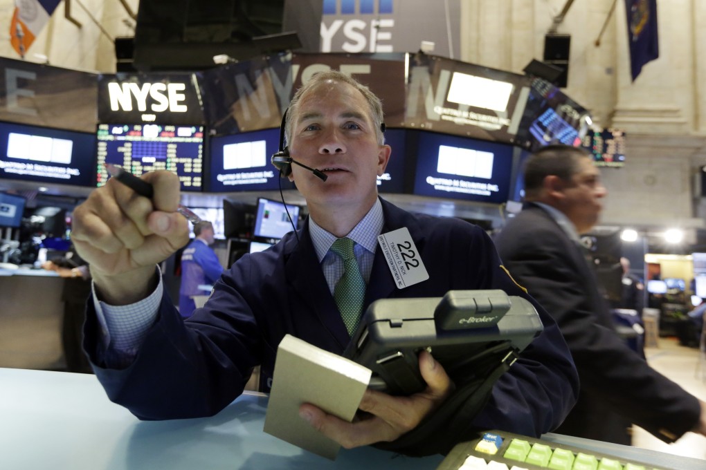 Traders in the New York Stock Exchange on Wall Street. Photo: AP