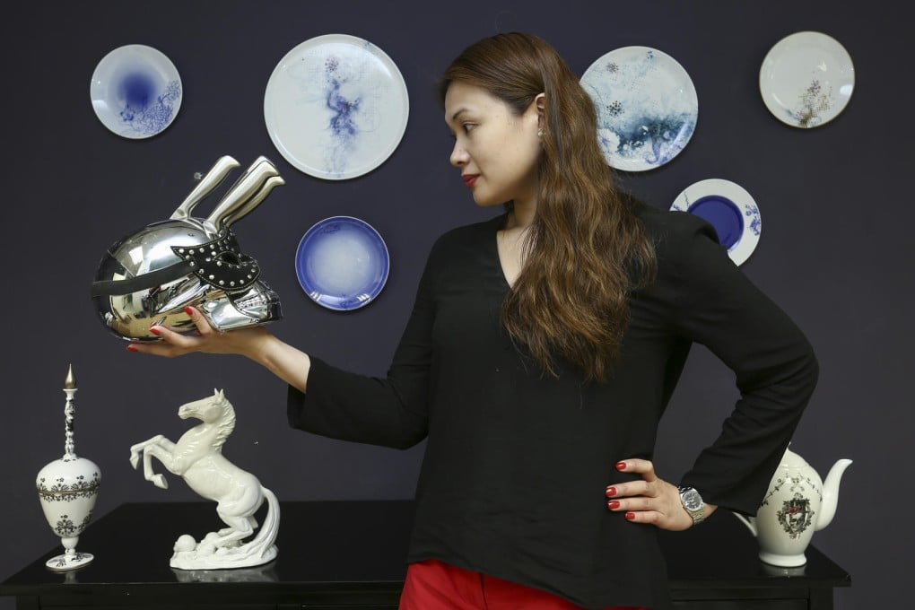 Monica Tsang with her skull knife and other designs (below). Photos: Jonathan Wong