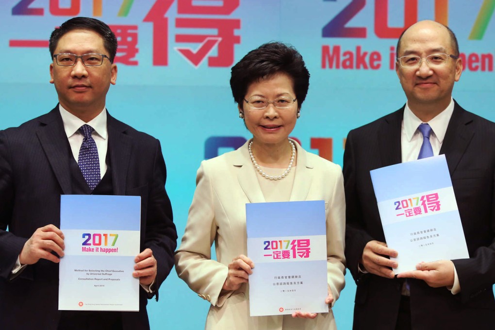 The Chief Secretary, Carrie Lam (middle) and her political reform team meet the press after Lam's speech on the political reform proposal yesterday. Photo: Sam Tsang