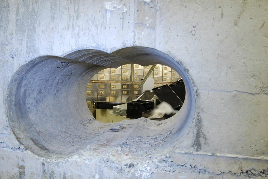Part of the investigation is focusing on how the robbers managed to climb through the relatively small hole they made. Photo: Reuters