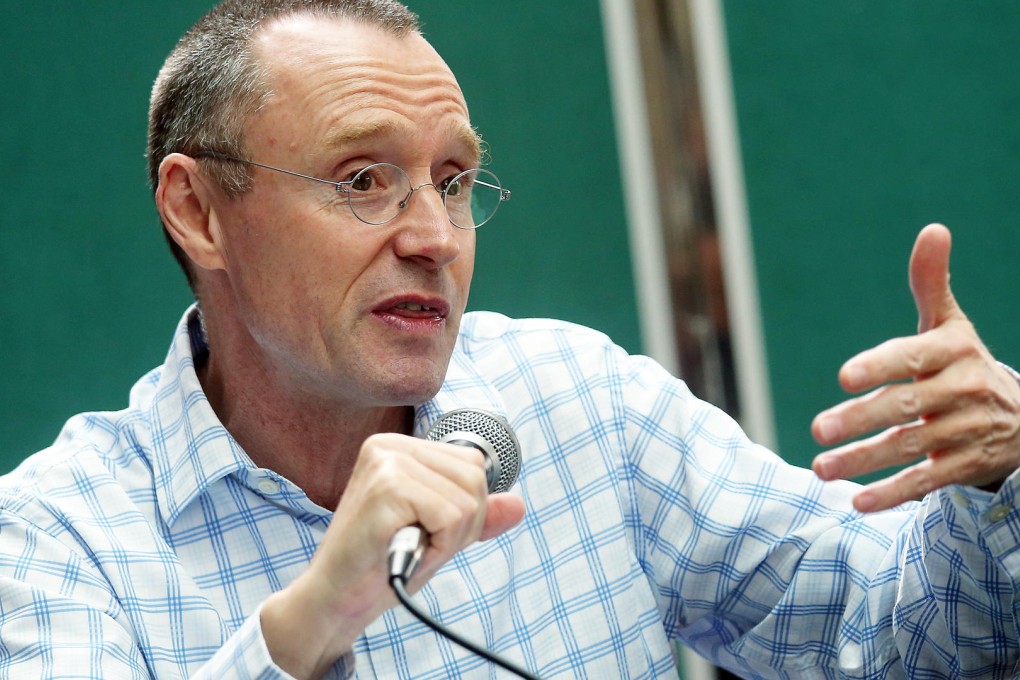 University of Hong Kong pro-vice-chancellor Professor Ian Holliday addresses yesterday's open forum, which was attended by students, staff and alumni. Photo: David Wong