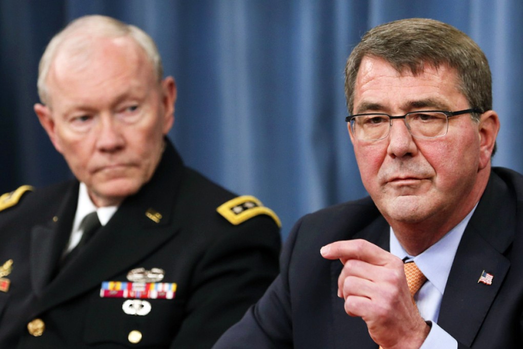 US Defence Secretary Ash Carter (right), pictured with Joint Chiefs of Staff chairman Martin Dempsey, is in California trying to reach out to tech firms for help on cybersecurity. Photo: AFP