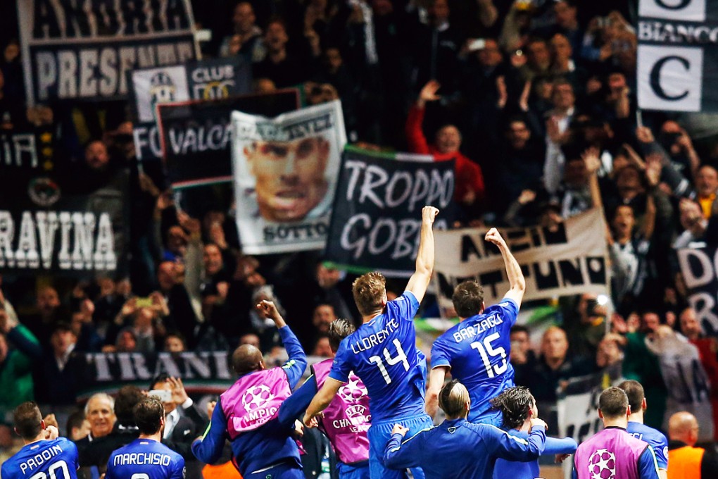 Juventus players celebrate with their fans. Photo: AFP