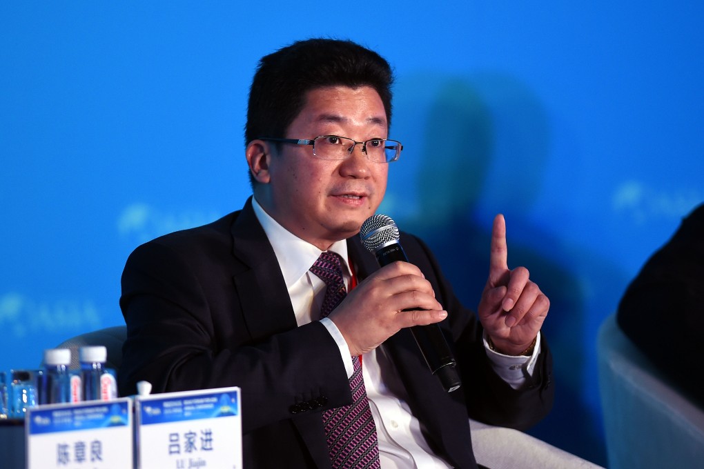 Lu Jiajin, president of the Postal Savings Bank of China, addresses a forum. Photo: Xinhua