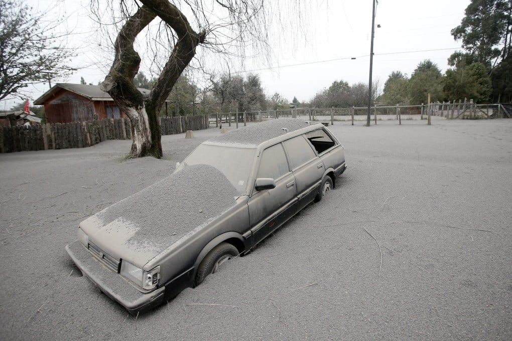 A car is covered in ash at Ensenada in Chile, on the outskirts of the Calbuco volcano, on Thursday. Photo: EPA