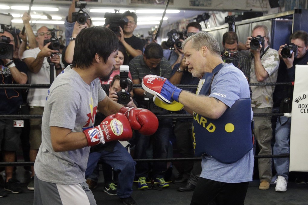 Manny Pacquiao trains with Freddie Roach during a media workout. Photo: AP