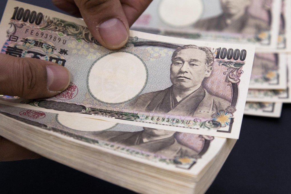 Japan needs to ensure its currency remains weak so that more foreign earnings in yen terms are repatriated. Photo: Bloomberg