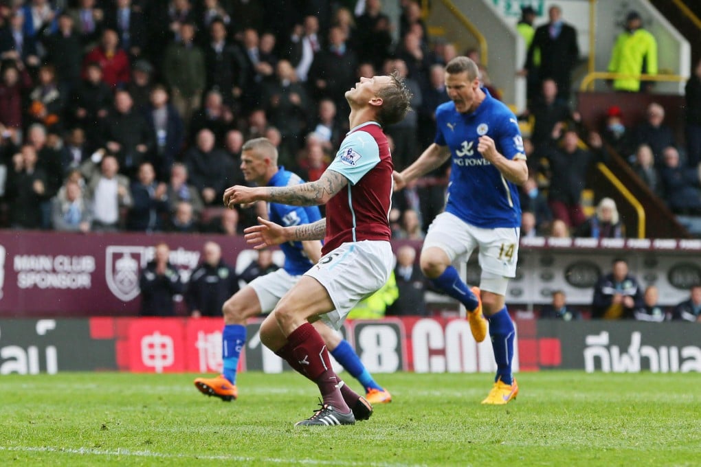Matt Taylor misses a crucial penalty for Burnley. Photo: Reuters
