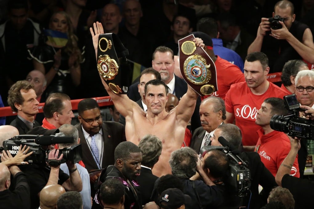 Wladimir Klitschko celebrates his title defence. Photo: EPA