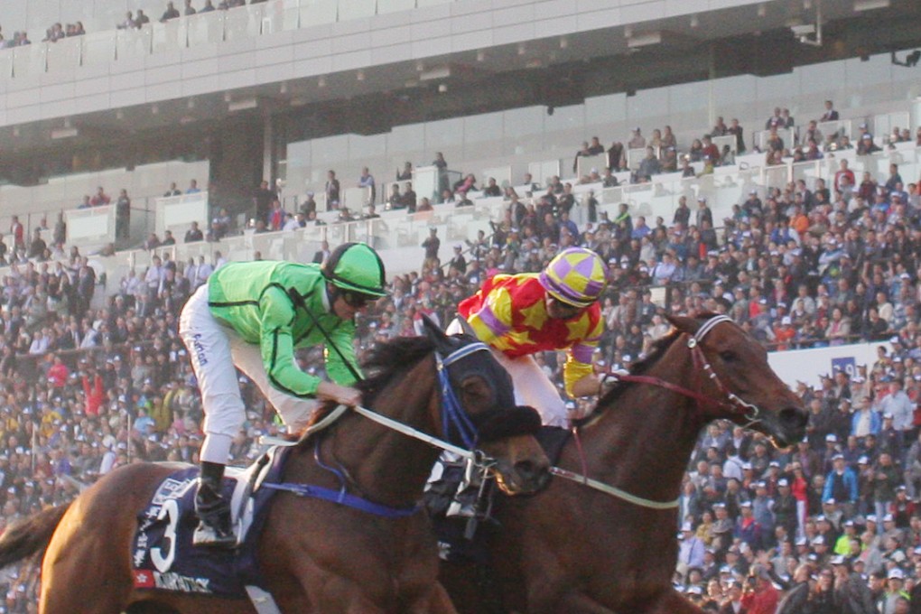 Joao Moreira and Zac Purton were neck and neck in the Hong Kong Cup in December. Photo: Kenneth Chan