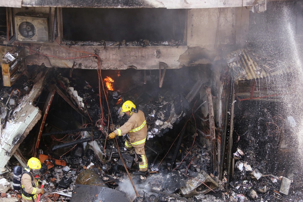 The garage owner and a cab driver who had just dropped his vehicle off for repair were among those killed in the explosion. Photo: Sam Tsang