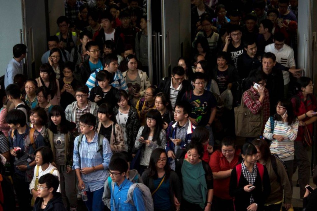 Chinese students leaving a SAT test centre. China's middle class is now the most willing in Asia to send their children abroad for education. Photo: Reuters
