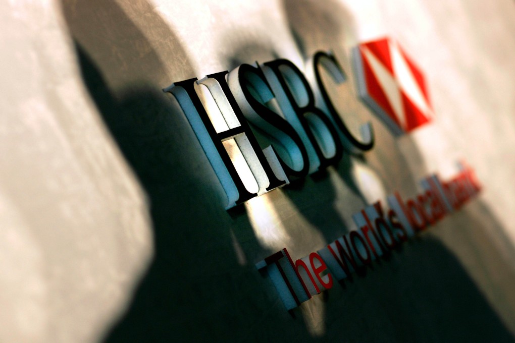 Shadows cover the HSBC logo in London as shares of the banking conglomerate jump in Hong Kong on reports the company will move its company headquarters out of Britain. Photo: Reuters