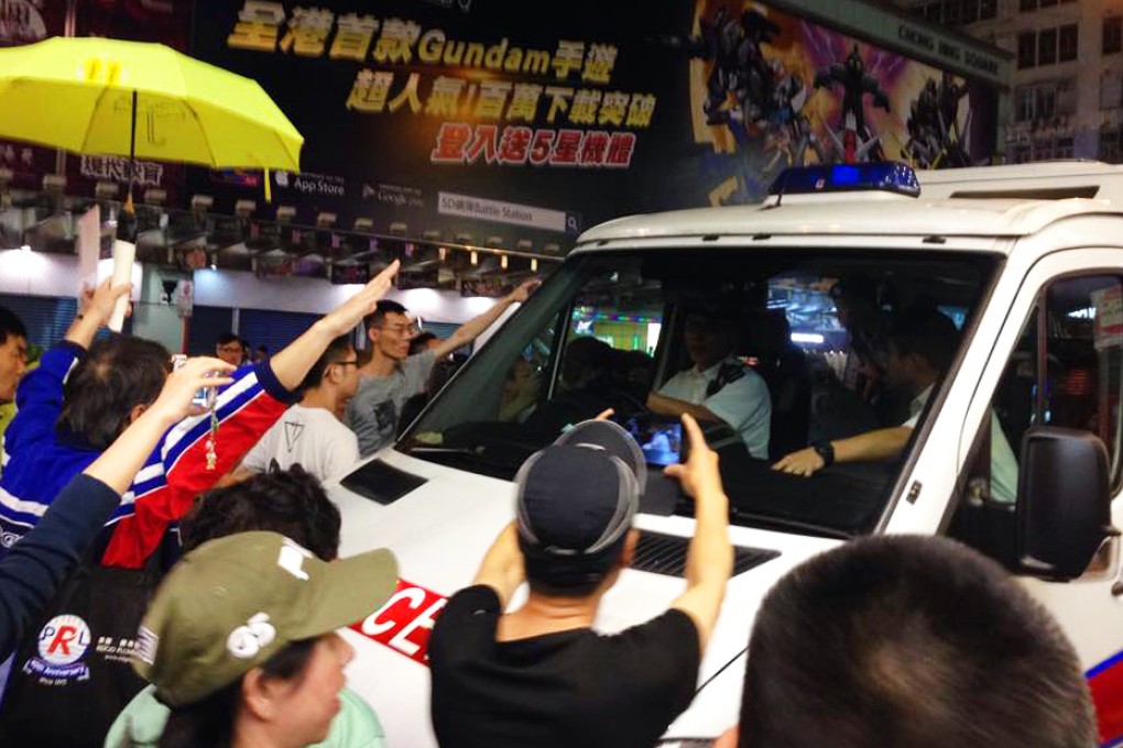 The overnight drama began unfolding around 10.30pm on Sunday as a group of about 40 protesters marched along Nathan Road in Mong Kok in protest against the government's political reform package. Photo: Resistance Live's Facebook
