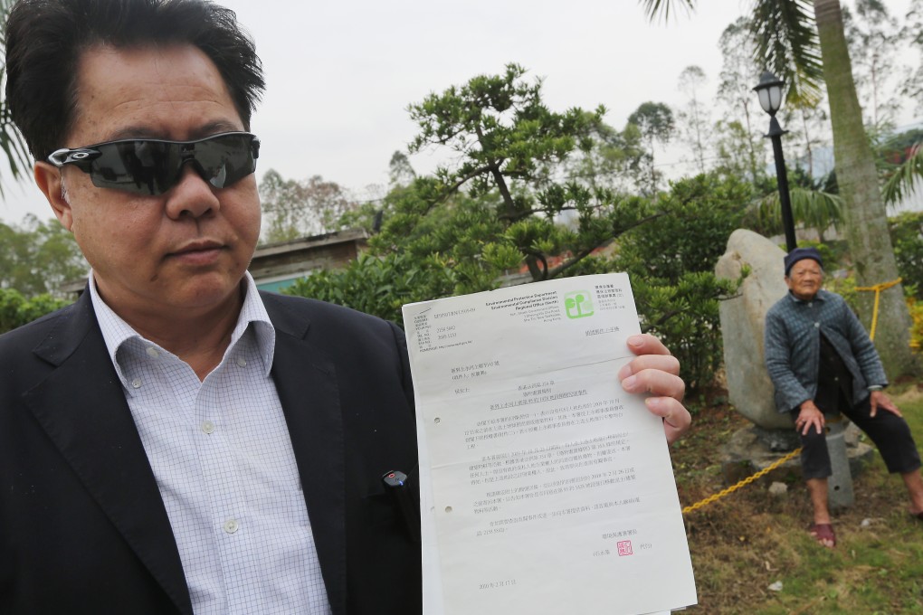 Hau Chi-keung (left) and a property agent were ordered by a court to pay HK$1.41 million in compensation to farmer Lau Oi-kiu. Photo: Sam Tsang