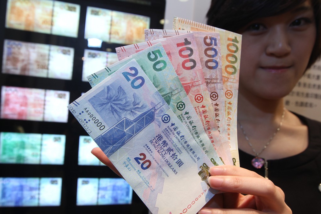 Hong Kong dollar bank notes are shown in a bank as the city's currency continued to trade at the upper end of its peg in the foreign exchange market here. Photo: Sam Tsang