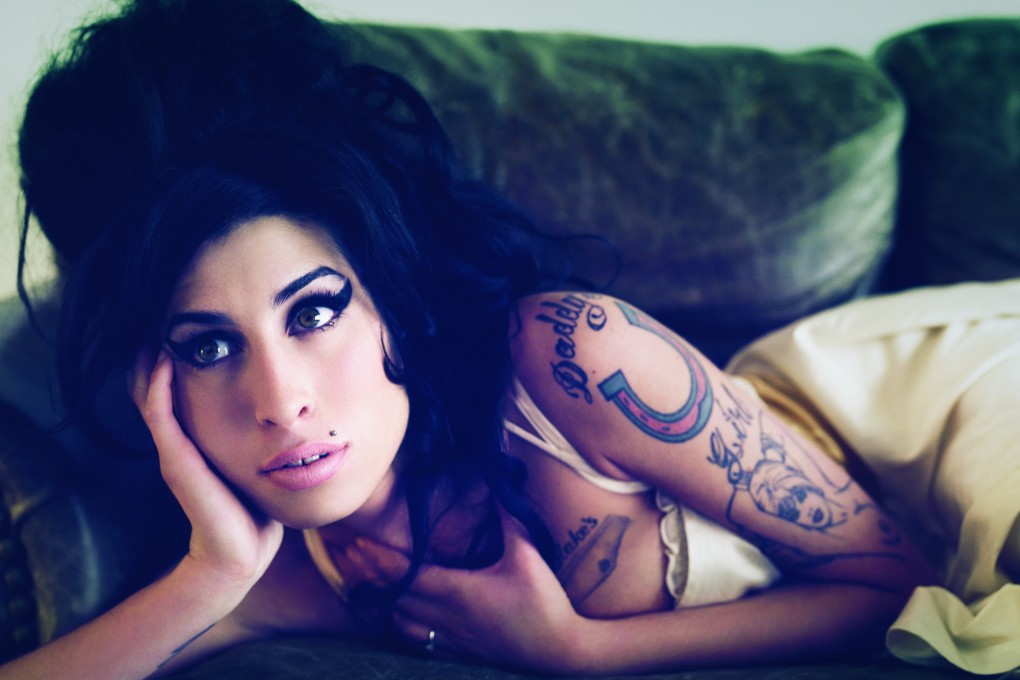 Amy Winehouse died of alcohol poisoning at age 27. Her family says a new documentary about the singer does not reflect the "huge effort from all concerned to help Amy at all stages". Photo: Handout