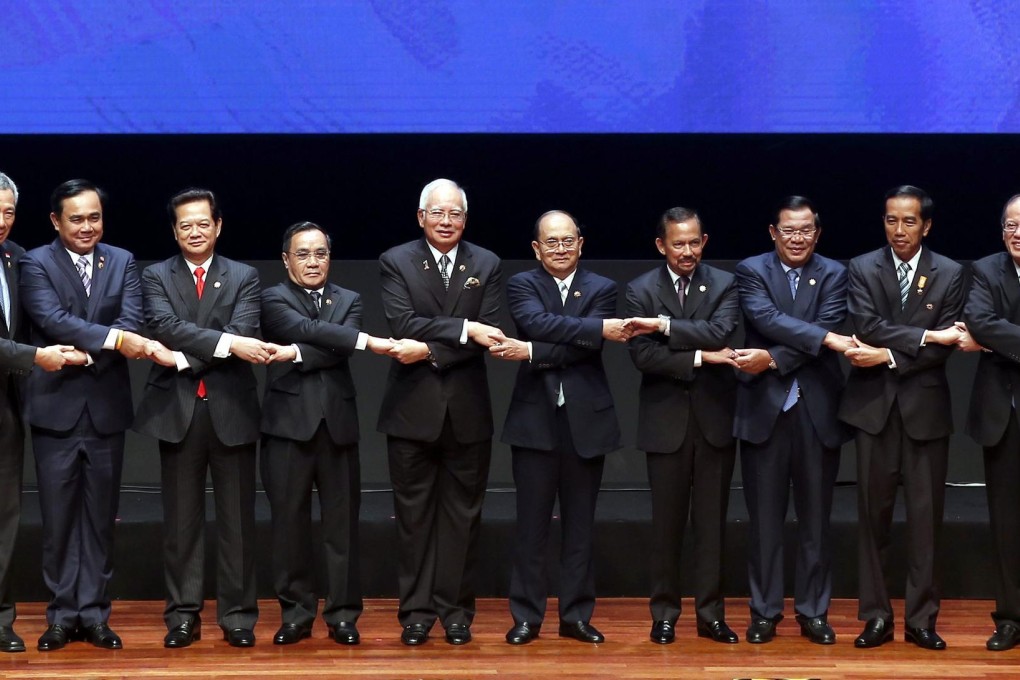 Association of Southeast Asian Nations leaders link up during the opening ceremony of the Asean summit at the Kuala Lumpur Convention Centre in Malaysia. Photo: EPA