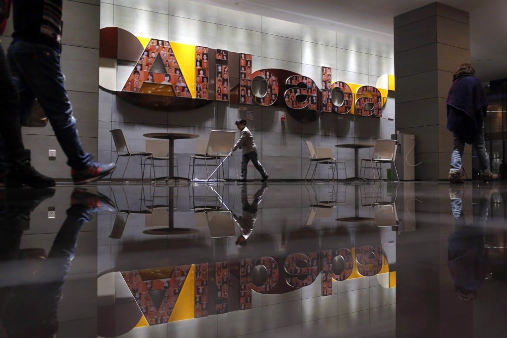 Alibaba's gleaning company headquarters. Cash-rich internet giants from China are likely on the prowl for acquisitions in the years ahead. Photo: Reuters