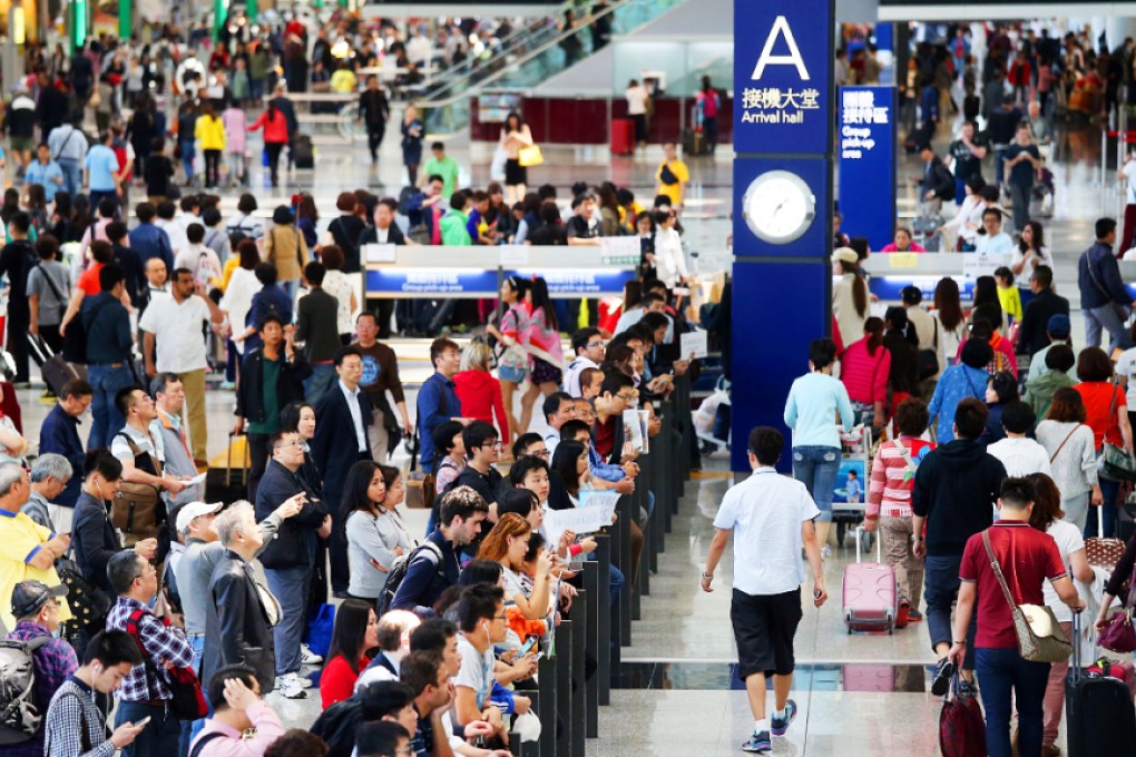 The arrival hall at Chek Lap Kok airport, which a UN office says is a key transit point for human smuggling. Photo: K.Y. Cheng