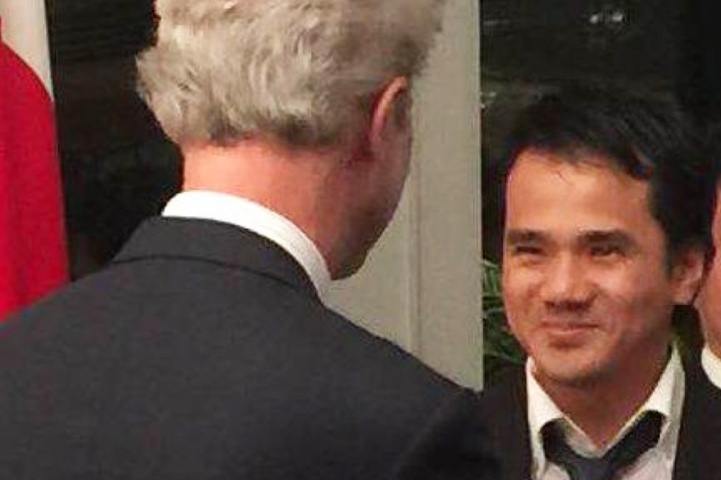 Chu Tsz-tat receives his award in Tokyo. Photo: Kyodo