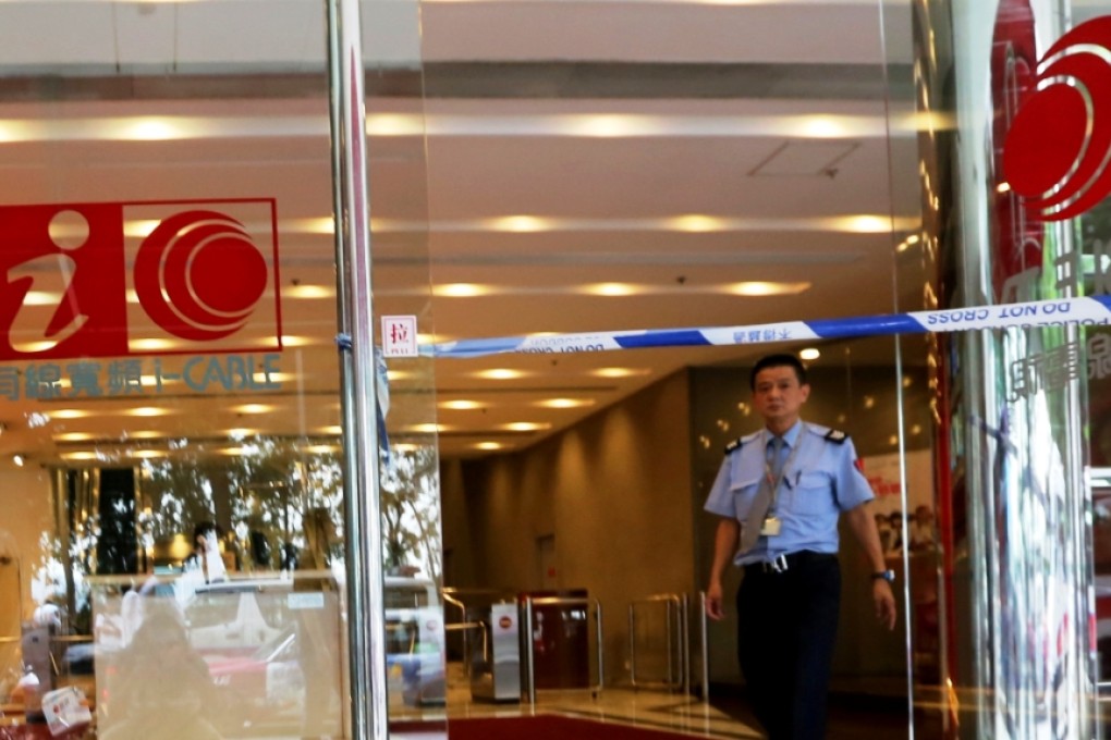 Police cordon off the crime scene following the knife attack at i-Cable's Tsuen Wan headquarters last year. Photo: Felix Wong