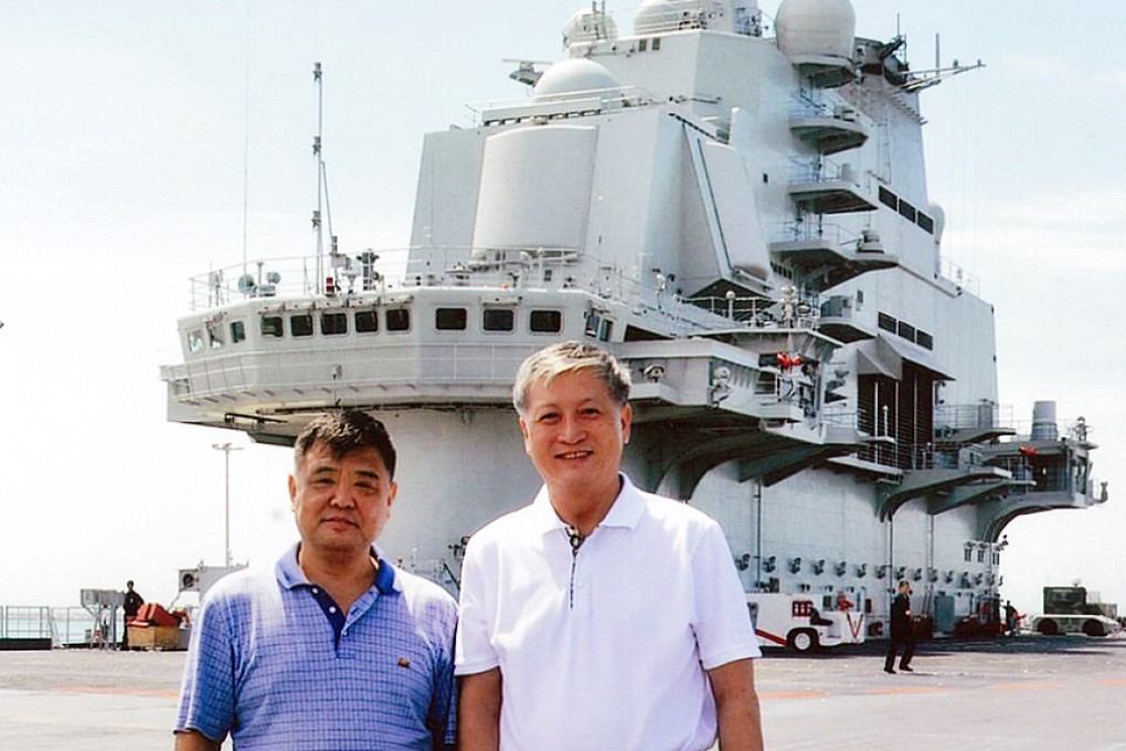 An undated picture shows Xu Zengping (right) and former deputy commander of the PLA Navy Su Shiliang boarding on the deck of Liaoning. Photo: SCMP Pictures