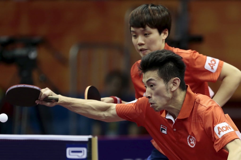 Hong Kong's Wong Chun-ting (front) and Doo Hoi-kem secured a bronze medal in the mixed doubles. Photo: Reuters