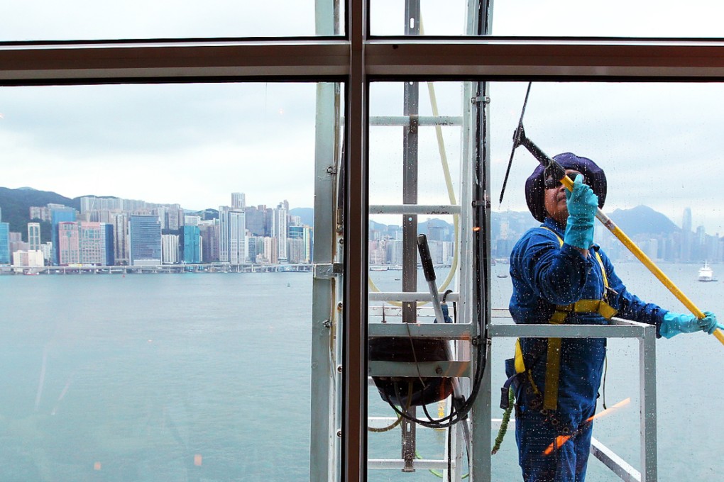 A cleaner on Royal Caribbean International's Mariner of the Seas. Catherine Yan, convenor of the Environmental Services Contractors Alliance, said cleaners are now paid HK$35 to HK$36 an hour on average. Photo: Nora Tam