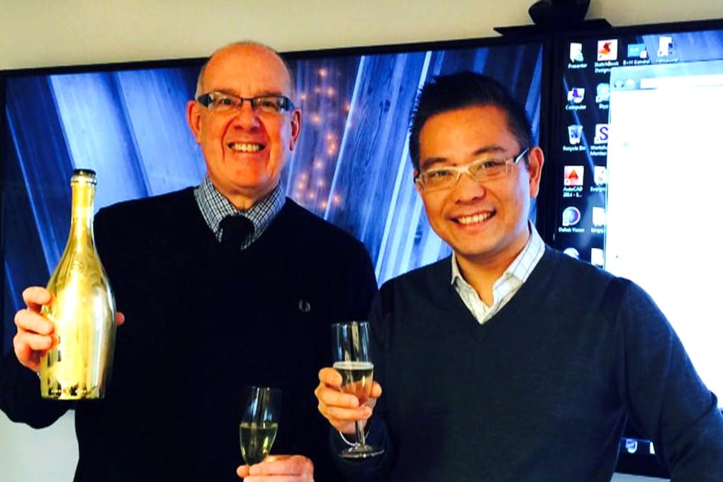 Michael Ching Mo Yeung (right) and Opus Hotel Corp president John Evans, toast the agreement to create an Opus hotel in Ching's International Trade Centre development near the Vancouver International Airport, in this image posted to Twitter by Evans on December 16. Photo: Twitter