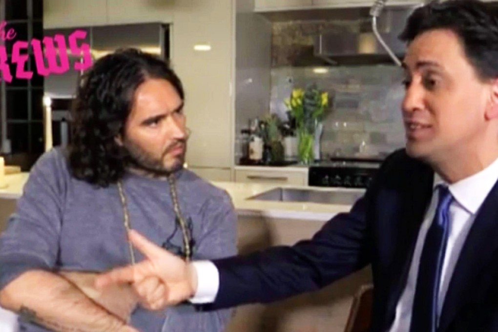 Ed Miliband (right) with Brand.