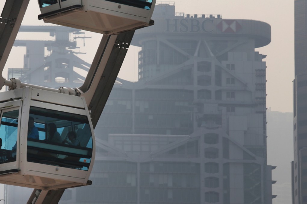 Smog soaked sky during a polluted day at the Hong Kong Observation Wheel in Central. Fine particle pollution routinely exceeds WHO levels. Photo: David Wong